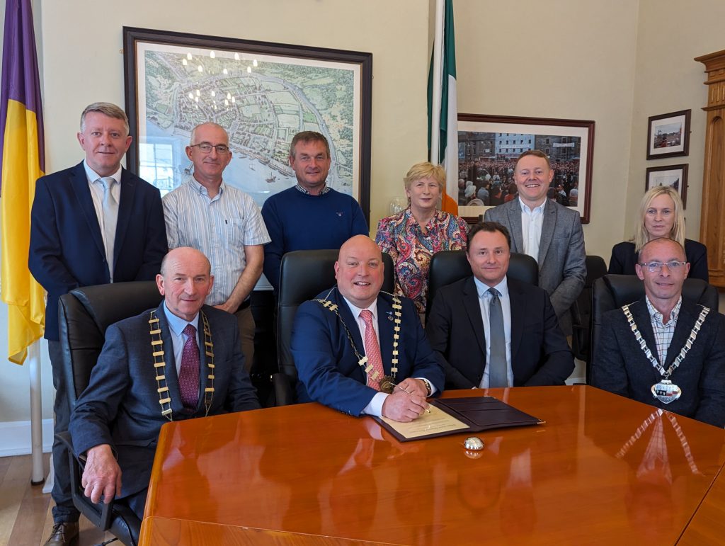 Image of Wexford County Council and Fehily Timoney representative at South East Greenway contract signing